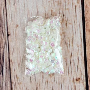 20200925_220329.jpgv1608652719 Paillettes iridescentes de 6 mm (12 gr.)