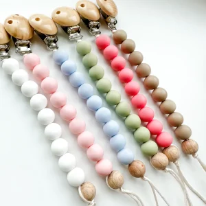 Attache-Suce.jpgv1689352696 Attache-Suce en Silicone - Clip en Bois